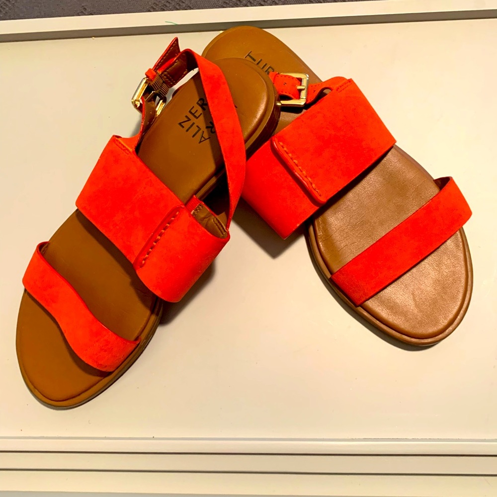 Tangerine suede sandals.